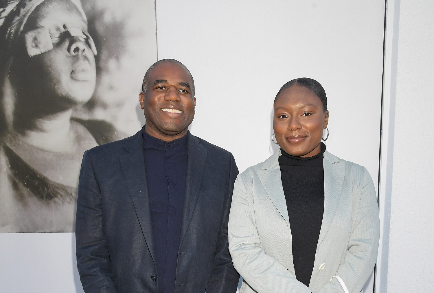David Lammy MP and IntoUniversity student Lady Tettey at the unveiling of 'Breath is Invisible', launching with an installation of works by Grenfell artist Khadija Saye in Notting Hill
