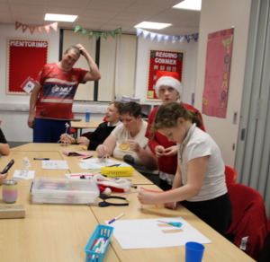 The Hughes family taking part in an Engineering-themed Family Learning session